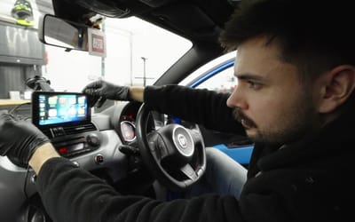 Men try out a $46 cheap Apple CarPlay and Android Auto adapter to see if it's better than expensive alternatives