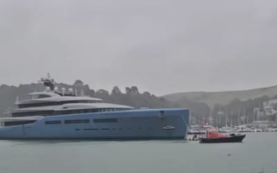 British locals weren't happy when a billionaire's $300,000,000 superyacht took over their small town for weeks