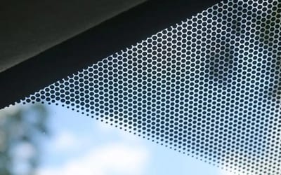 This is what the black dots on your windscreen actually do as they serve four purposes