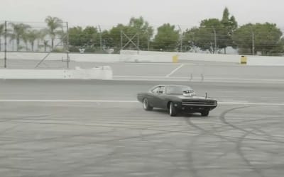 Vin Diesel teases Fast &amp; Furious movie by spinning donuts at California speedway in iconic Dodge Charger