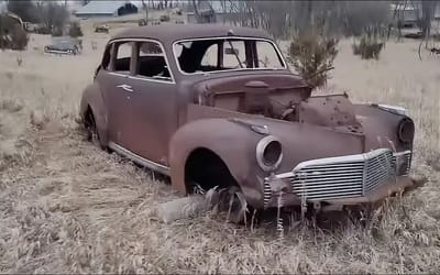 Abandoned Kansas farmstead acts as a time capsule due to multiple cars frozen in time