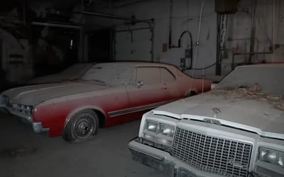 Dealership abandoned 20 years ago found packed with iconic American cars trapped inside