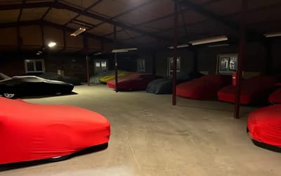 16 ‘highly-rare’ Ferraris and 6 ‘highly-rare’ Porsches unearthed inside old warehouse