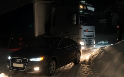 audi-quattro-pulls-truck-out-of-snow