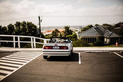 Japan has a custom of parking further away from an exit if you arrive early