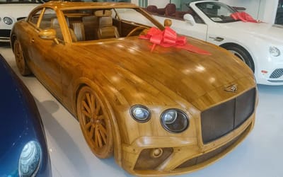 Mystery artist turns Bentley into full‑size wooden sculpture and it’s listed for nearly $100k