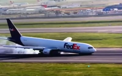 Boeing cargo plane forced to land on its nose after front landing gear fails mid-flight