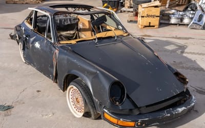 Porsche 911S accidentally buried years ago by an equipment operator sold for $850 after hilarious video goes viral