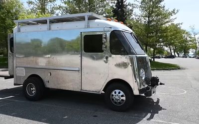 This incredible camper with mahogany interior was made from abandoned bread truck