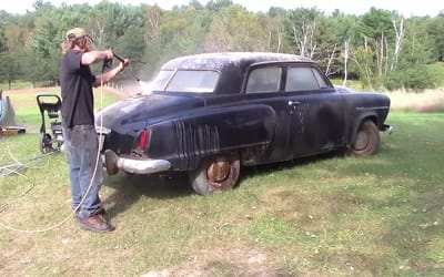 Man cleaning classic Studebaker abandoned in barn for 40 years is stunned by what he finds beneath the grime