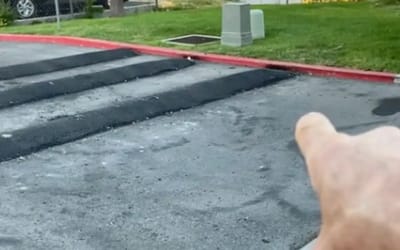 Man fed up with people speeding down his road builds DIY speed bumps