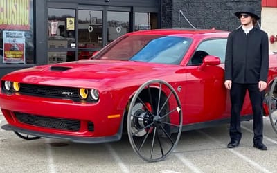 Weirdest mod ever? Guy puts horse and carriage wheels on a Dodge Challenger