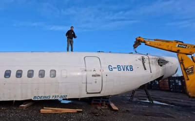 Man cutting up a Boeing 737 into a nuclear fallout shelter finds personal touches left inside plane