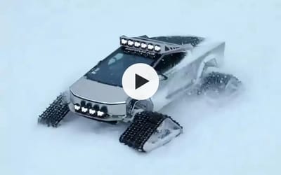 Cybertruck plows through snow with crazy track wheels while towing in jaw-dropping video