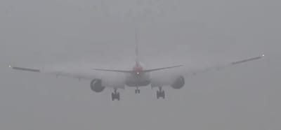 Pilots leave people wondering how they managed to land as video shows landing in very thick fog with near-zero visibility