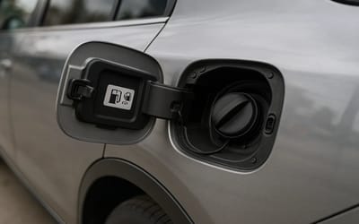 Video shows trio hilariously defeated by a stubborn Cupra gas door that refuses to stay shut