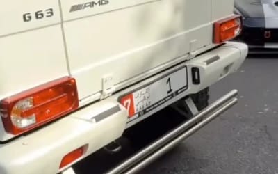 Arizona man films fleet of multi-million dollar cars with final license plate worth more than them all