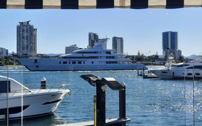 Onlookers blown away when mystery billionaire pulls up in superyacht with a whole police escort
