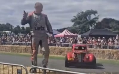 Man gets out of his car while it's still drifting to greet people at Santa Pod Ultimate Street Car show
