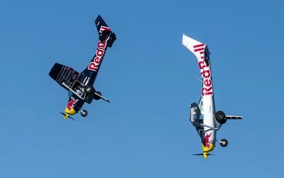 Pilots lose their licenses after trying to exchange planes mid-air in jaw-dropping Red Bull stunt