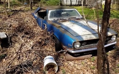 Muscle car magic strikes again as a 1968 Camaro Z/28 emerges from a barn with its original V8