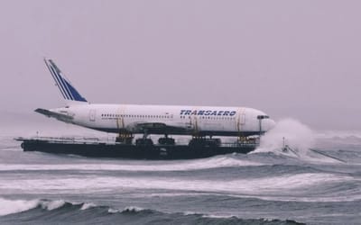 boeing-767-airliner-towed-on-sea