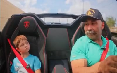 Kids filmed in accelerating Lamborghini and while one is incredibly chilled the other is anything but