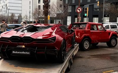 A Lamborghini LM002 was seen towing a Revuelto through street in huge flex