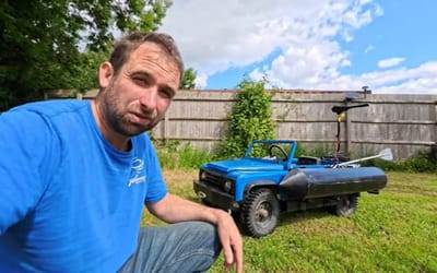 English dad transforms his sons mini Land Rover into an amphibian machine and drives it across a lake