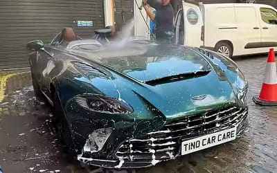 Man goes round London cleaning the street-parked supercars