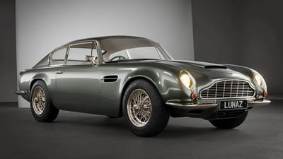 This flawless $1,000,000 green and gold Aston Martin DB6 is the ultimate restomod and it is completely mind blowing