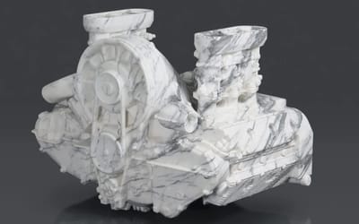 This artist is carving a life-sized Porsche 911 out of solid marble