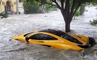 Mechanic attempts to restore THAT flooded $2 million McLaren P1 