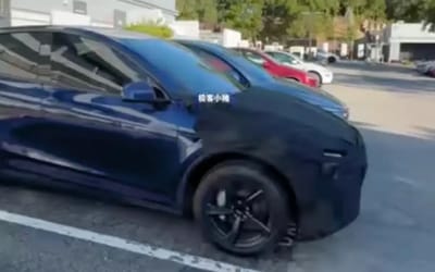 Even before you're inside the new budget Tesla you'll notice exactly what's missing