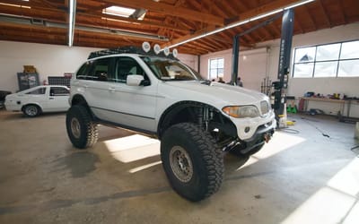 Men put absolutely wild mods on a 'soccer mom' car to turn it into a total off-roader
