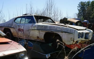 Michigan junkyard holds rare muscle cars from Detroit's glory days including a 1970 Pontiac GTO Judge