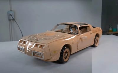 Watch as Pontiac Firebird Trans Am is whittled out of wood