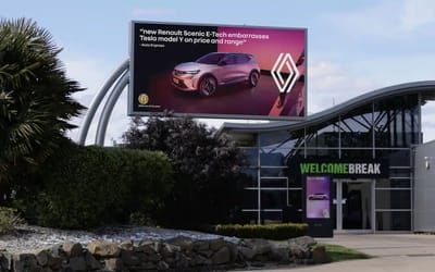 Renault targets UK Tesla drivers with cheeky customized billboard messages