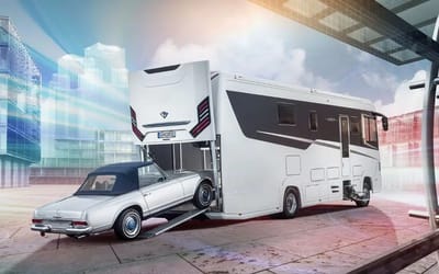 Luxury RV has its own garage on the back so you can take your car on vacation