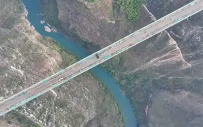 China cut a mountain in half in order to build a highway including the world's highest bridge