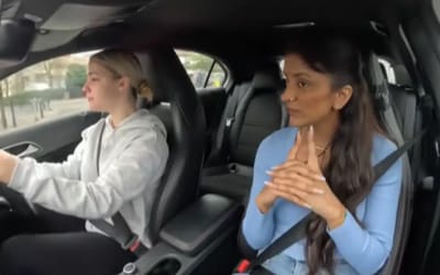 Learner driver confused after being told to keep going at red light