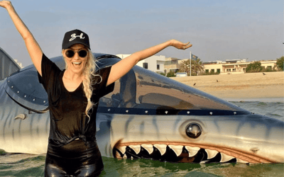 Supercar Blondie rides in a shark jet ski after training with a world champ