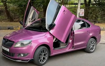 Man fits his Skoda Rapid with scissor-style doors so it feels like he has a Lamborghini