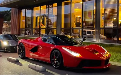 Aston Martin Valkyrie, Ferrari LaFerrari, and Ferrari LaFerrari Aperta pull up to drive-thru shocking diners