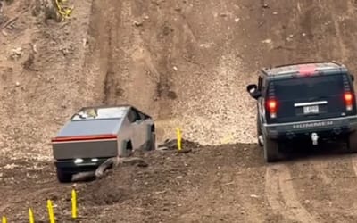 Hummer shows off cool flex as it takes on a Tesla Cybertruck in an off-road climb