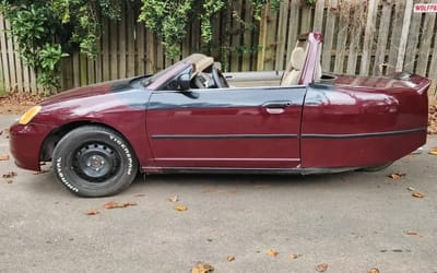 It’s impossible to know what went through someone’s mind when they created this three-wheel Honda Civic