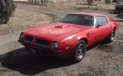Son rescues stepmother’s 1974 Trans Am after 35 years sleeping by the Mojave Desert