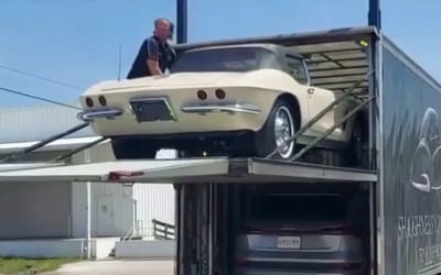 Vintage Corvette is dropped from car transporter as it’s delivered to its new owner