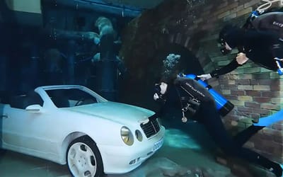 We dived into the world’s deepest pool to find its supercar secret at the bottom