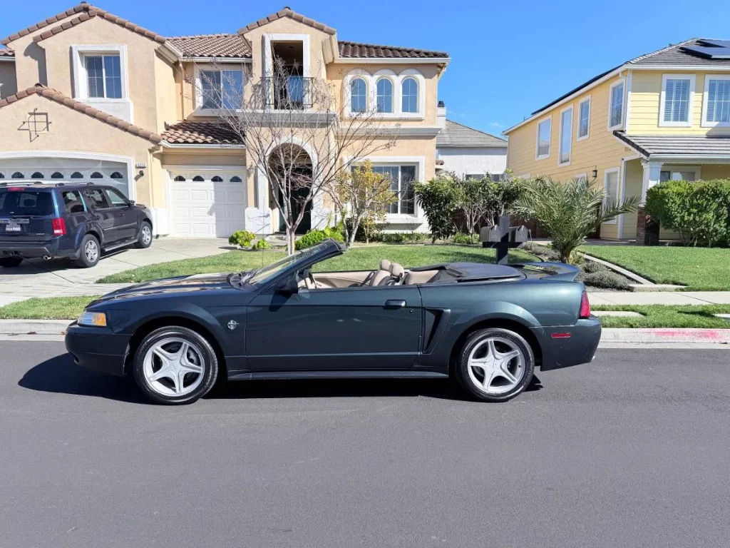 This low-mileage 1999 Ford Mustang GT provides a high-output V8 engine and serves as a prime example of affordable performance for budget-conscious buyers